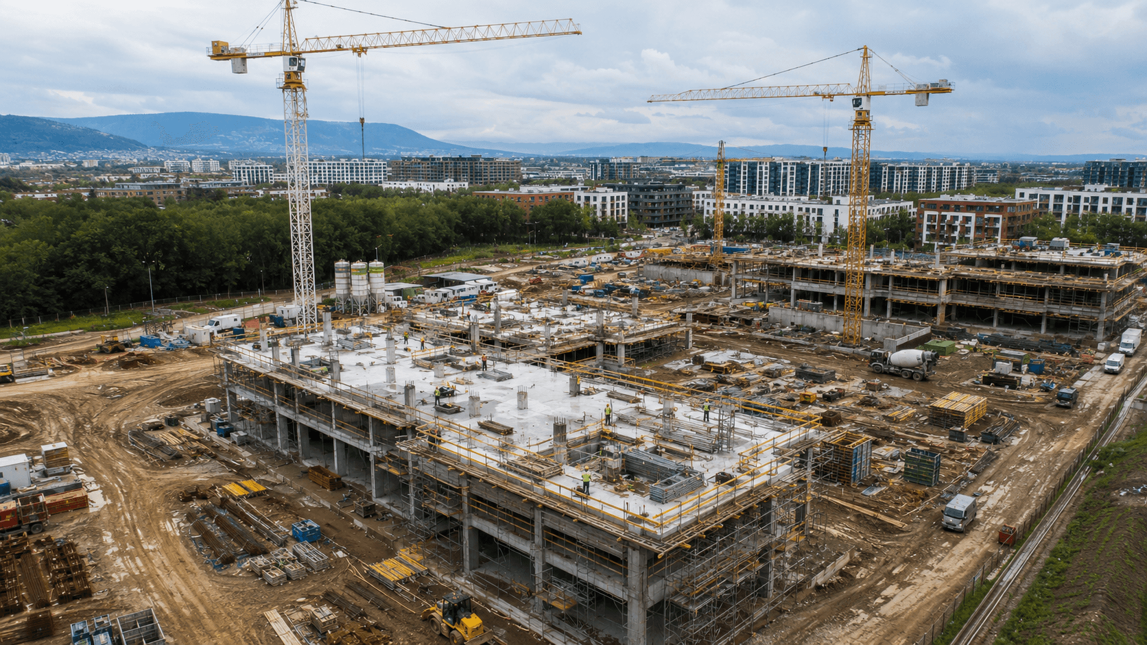 Wide aerial construction site view used for time-lapse progress documentation.